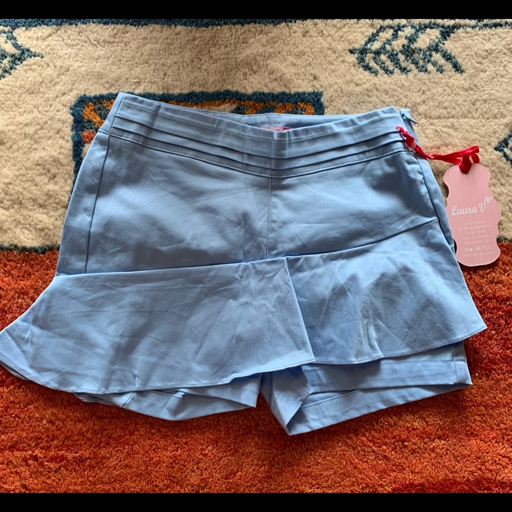 Laura V Skort